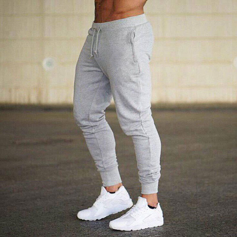 Slim-fit sports pants men Europe and the United States running fitness football feet casual trousers Tether tight training pants male